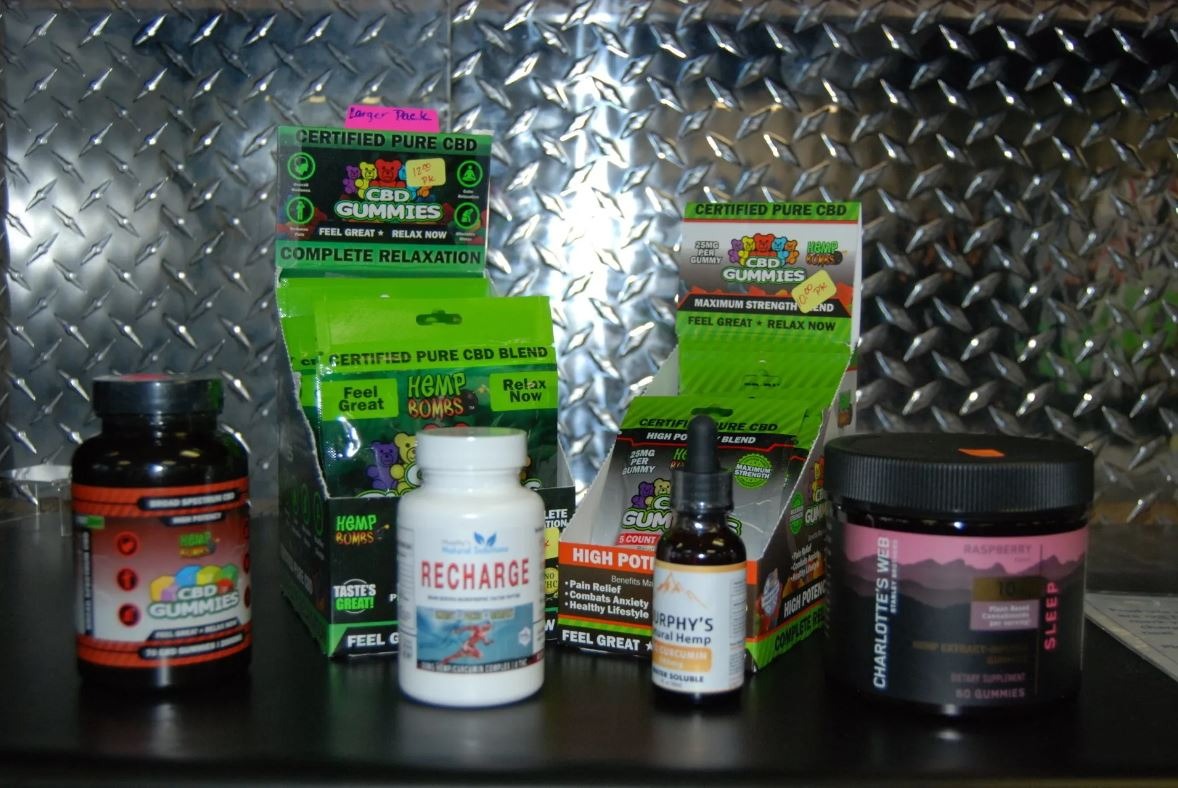 Tan extenders, goggles and Hempz lotions at the front desk